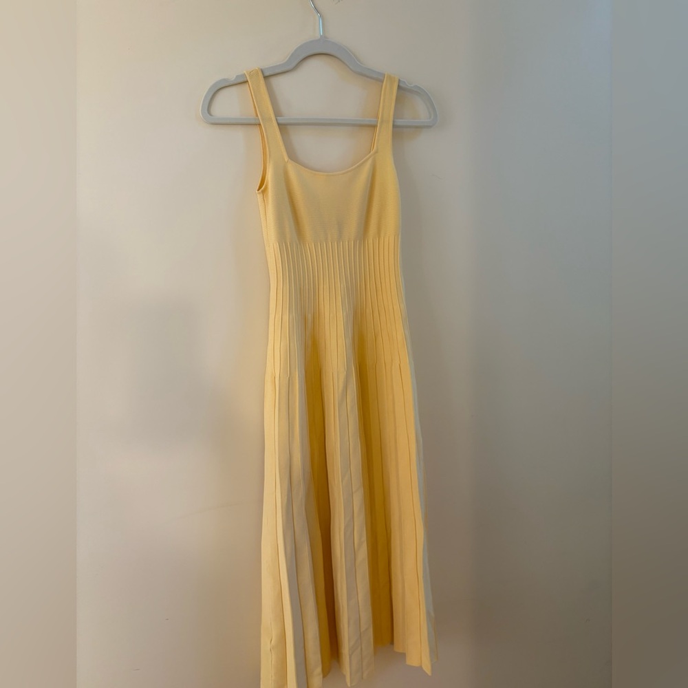 Elegant Yellow Pleated Dress by Staud 
Color- Lemon Drop 
Size XS 
WORN ONCE